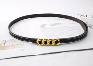 Slim black leather belt for women with white stitching and a golden chain-link buckle