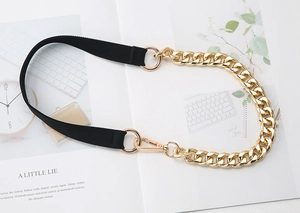Detail of elastic waist belt with detachable chunky gold chain and lobster clasps
