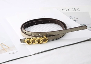 Detail of slim khaki Saffiano leather belt for women with gold three-ring chain buckle