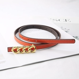 Minimalist orange skinny belt for women with elegant gold chain buckle and cross pattern