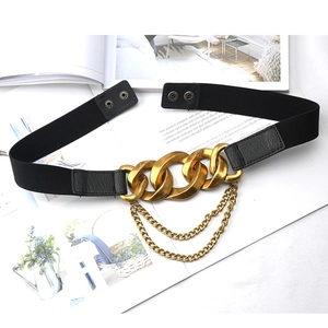 Elastic black waist belt with decorative gold chain links for dresses and coats
