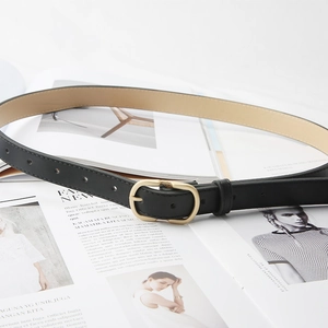 Classic black leather belt for women with elegant golden oval textured buckle