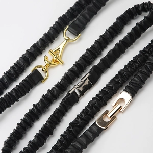 Elastic black waist belt for women with multiple gold and gunmetal buckle options