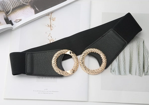 Close-up of black elastic waist belt featuring textured gold double ring buckle detail