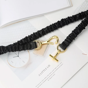 Chic black pleated leather elastic belt with stylish gold hardware clasp for women