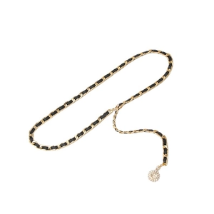 Vintage gold metal chain belt with black leather weaving and sun pendant on white back