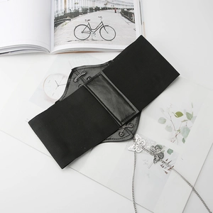 Black wide elastic corset belt with leather lace-up front, metal chains and butterfly charm