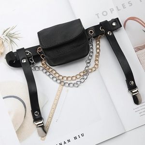 Detail of punk black leather thigh garter with metal chains and functional storage pouch