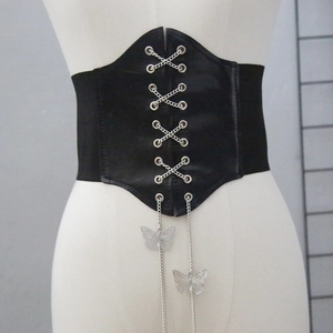 Gothic style black waist belt featuring silver metal eyelets, chains and butterfly pendants