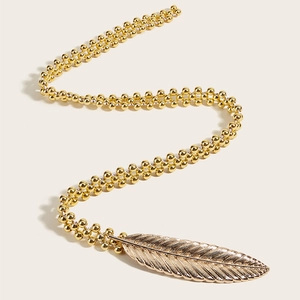 Elegant gold metal waist chain with triple beaded layers and feather shaped buckle for dresses