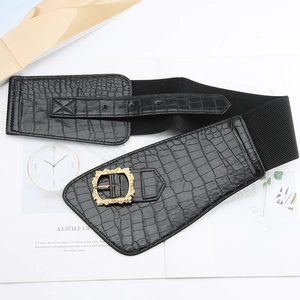 Women's wide black elastic waist belt with gold vintage buckle and crocodile texture