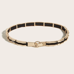 Women's black elastic waist belt with luxury gold metal chain and circular buckle