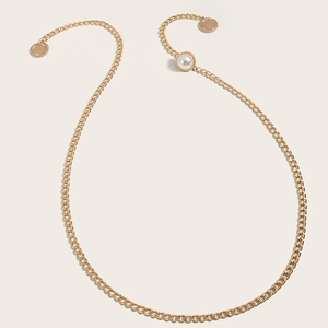 Elegant gold metal waist chain for women with a large white pearl and polished round pendants