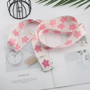 Ceinture femme en toile crème avec motif floral rose et boucle en métal à fleur mate