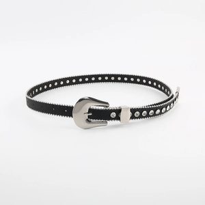 Detail of slim black belt with silver horseshoe buckle and rhinestone bead trim