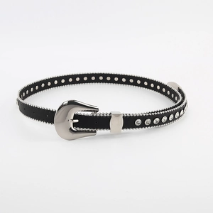 Detail of black leather belt featuring silver studs, rhinestones, and horseshoe buckle