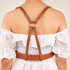 Women's brown punk leather body harness with silver rings for dresses and shirts