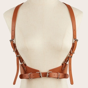 Detailed view of punk brown PU leather body harness with adjustable metal buckles