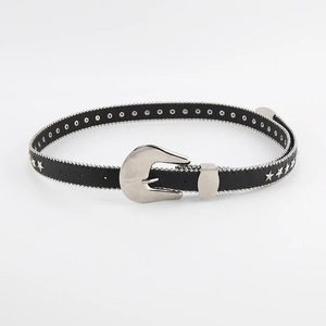 Detail of black leather belt with silver star studs and vintage western buckle