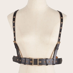 Harnais de corps punk en similicuir noir avec œillets métalliques dorés réglables pour femme