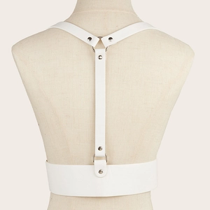 White faux leather body harness with silver rings and Y-back strap details