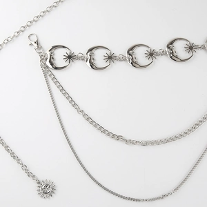 Silver multi-layer waist chain featuring celestial moon stars and sun pendant charms