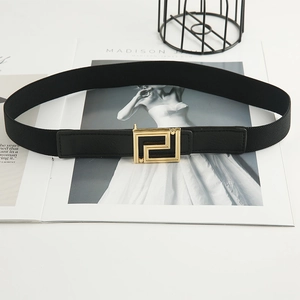 Elastic black waist belt with a modern gold geometric buckle for dresses and coats