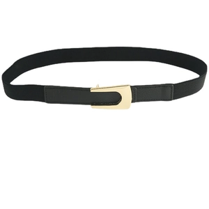 Women black elastic waist belt with a polished gold U-shaped metal buckle for dresses