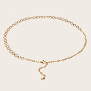 Elegant gold metal chain belt for dresses featuring an adjustable lobster clasp and rhinestone