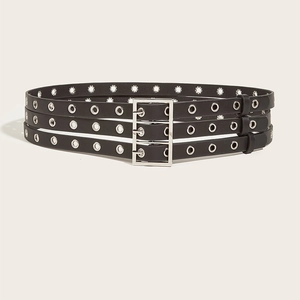 Ceinture punk noire à trois rangées d'œillets métalliques avec boucle argentée à ardillon