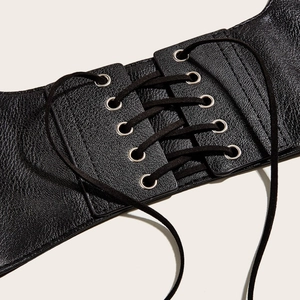 Chic black leather waist corset belt with silver eyelets and punk style cross lacing