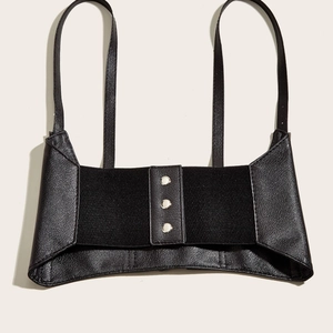 Fashionable black punk corset belt with metallic buckles and thin shoulder straps