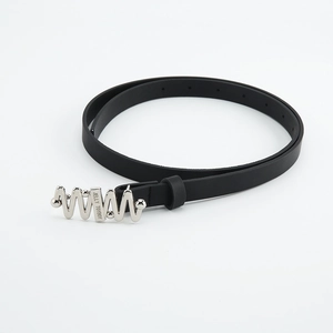 Detailed close-up of a slim black leather belt with a silver wavy buckle for women