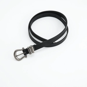 Vintage black leather belt for women with silver horseshoe buckle on white background