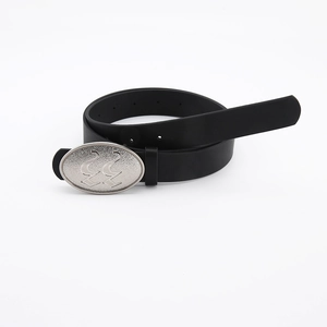 Close-up of black leather belt with silver oval buckle and smooth textured metal finish