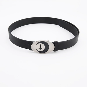 Women's black faux leather belt with silver oval buckle featuring crescent moon and star