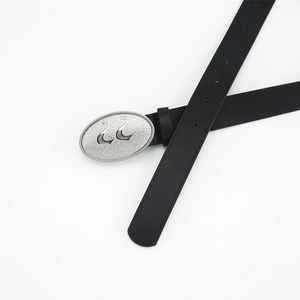 Minimalist black leather belt for jeans featuring a matte silver oval buckle