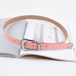Pink vintage leather belt for women featuring an engraved silver buckle and metal tip