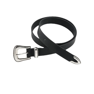 Vintage skinny black leather belt for women featuring a carved silver metal buckle and tip