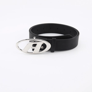 Minimalist black leather belt for women featuring a large oval silver metal buckle design