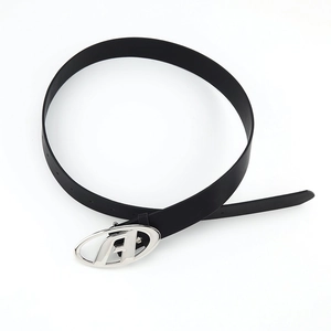 Close-up of black leather belt featuring a silver oval buckle with a hollow letter A design