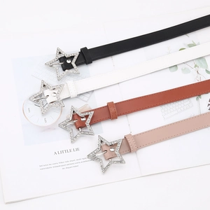 Detailed close-up of slim waist belts with sparkling rhinestone star buckles in four colors