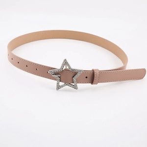 Detail of light pink leather belt featuring a sparkling star-shaped buckle with rhinestones