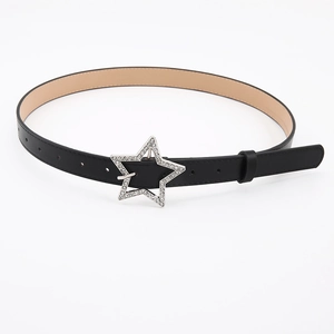 Close-up of black leather belt with silver star-shaped buckle encrusted with rhinestones