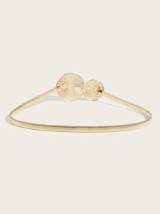 Elegant gold elastic metal spring belt with asymmetric sunburst texture round buckle