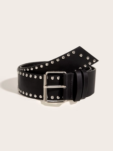 Detail view of a black punk leather belt with silver round metal rivets and square buckle
