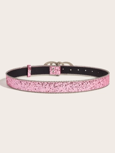 Close-up of pink glitter waist belt with silver metal beads and polished buckle detail