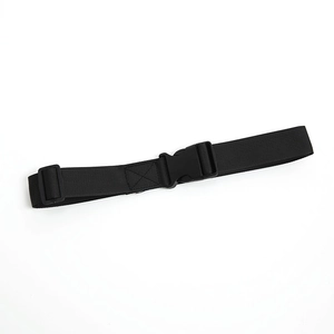 Close-up of black nylon webbing strap with plastic quick-release buckle and reinforced stitching