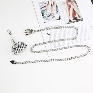 Silver metal chain belt with sparkling rhinestone mini bag accessory and heart pendant