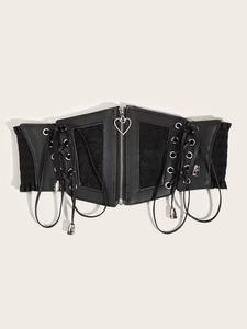 Detail of black lace corset belt with heart zipper and side lacing for dresses